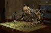 Bored-skeleton-at-desk.jpg